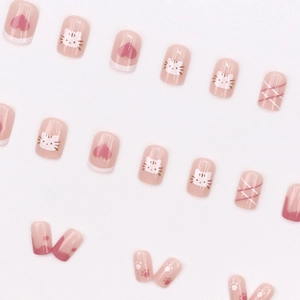 Pink and white cat pattern press-on nails with heart designs and glossy finish