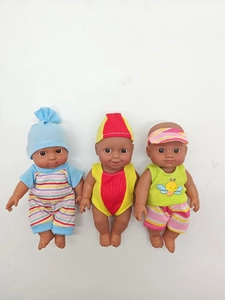 Three realistic black baby dolls in colorful striped outfits and hats on white background