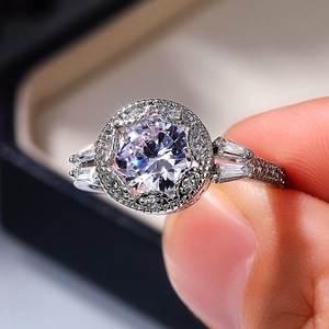 Luxury silver halo ring with large round zircon and baguette cut side stones