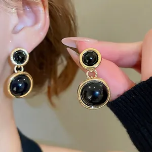 French retro gold resin round circle pendant earrings with minimalist geometric design