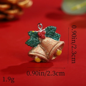 Macro view of gold and green Christmas bell pendant with size and weight details