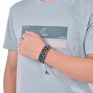 Close-up of multilayer braided bracelet with 8mm tiger eye and natural stone beads