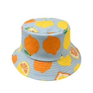 Light blue kids bucket hat with vibrant lemon prints for sun protection and summer wear
