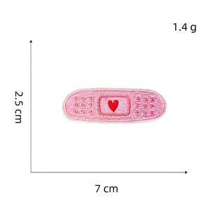 Detailed embroidery patch of pink bandage with heart, size 2.5x7cm, 1.4g weight