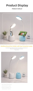 Detail view of eye-care LED lamp base featuring integrated pen holder and phone stand