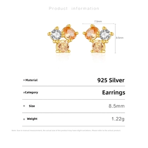 Detail view of 925 silver earrings with white and champagne zircon measuring 7.5x8.5mm