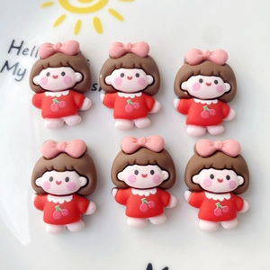Detailed view of six resin cartoon girl charms with red dresses for DIY phone case crafts