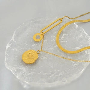 Vintage gold stainless steel heart necklace with double chain and relief pendant