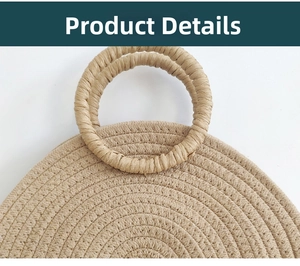 Detailed close-up of the woven texture and circular handle on this straw tote bag