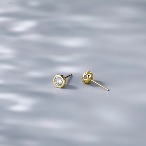 Elegant gold S925 sterling silver stud earrings with round zircon and heart hollow design