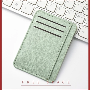 Slim mint green lychee grain leather card holder with three slots for daily commuting