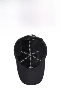 Detail of winter baseball cap interior featuring warm fleece lining and protective ear flaps