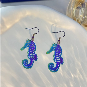 Iridescent laser-cut seahorse drop earrings with colorful gradient hollow metal design
