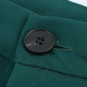Deep green straight-leg trousers featuring a dark four-hole button and twill texture