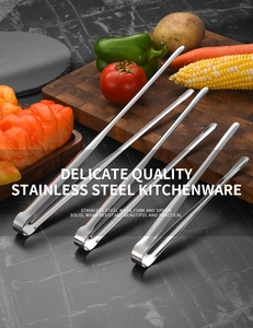 Set of four 304 stainless steel kitchen tongs for BBQ and serving on marble surface