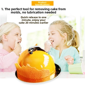 Yellow glazed mousse cake being shared by two girls showing smooth finish and perfect shape
