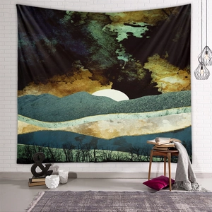 Detail of abstract landscape tapestry showing mountain peaks and white moon on a white wall