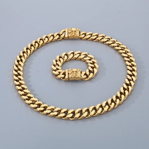 Gold Cuban chain necklace and bracelet set with skull clasp made of cast steel