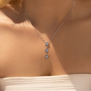 S925 sterling silver Y-shaped necklace with blue sapphire water drop pendants on model