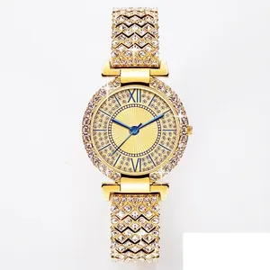 Luxury women gold quartz watch with full sparkling crystals and blue roman numerals