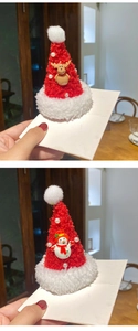 Detail of Christmas hair clips with plush red hats, cute reindeer and snowman motifs