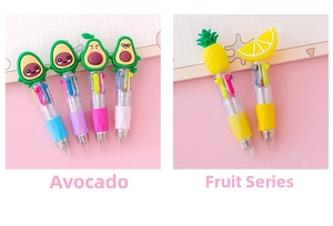 Close-up of cute fruit-themed multi-color ballpoint pens with cartoon avocado toppers