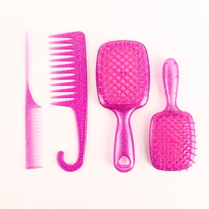 Detail van 4-delige haarborstelset in doorschijnend roze met zilveren glittereffect