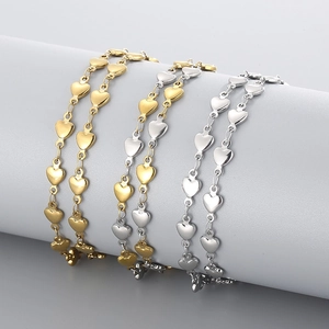 Minimalist stainless steel heart link bracelets in gold, silver, and two-tone finishes