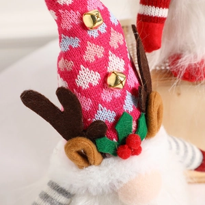 Lighted Christmas gnome plush with reindeer antlers and heart knit hat for holiday decor