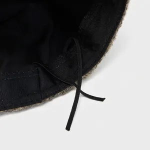 Internal view of wool flat top newsboy hat featuring an adjustable inner drawstring