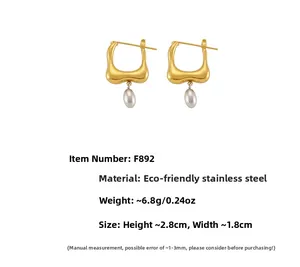 Detail showing dimensions of two-tone geometric stainless steel earrings with gold finish