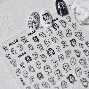 Abstrakte Nagelaufkleber mit schwarzen Porträts und Gesichtern auf transparenter Basis