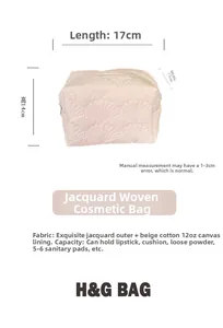 Quilted shell cosmetic bag with 17x11x14cm dimensions and jacquard fabric texture