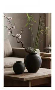 Jarrones minimalistas de cerámica negra con textura mate y acabado rústico zen