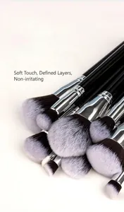 Detail of 40-piece makeup brush set with gradient bristles and black polished handles