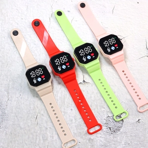 Multiple colorful digital LED square watches with astronaut icons and silicone straps