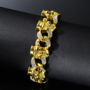 Punk style gold skull bracelet for men with top hats and sparkling white rhinestones
