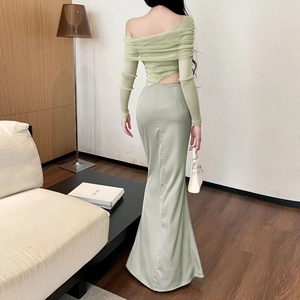 Rear view of light green satin two-piece set with off-shoulder top and mermaid skirt