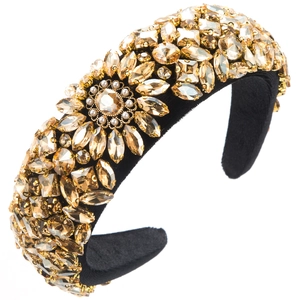 Sparkling crystal padded headband with floral pearl accent and champagne rhinestones