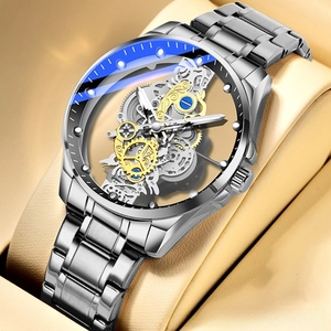 Close-up of skeleton mechanical watch dial showing precise gold and silver gear movement