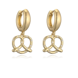 Gold pretzel heart earrings with clear cubic zirconia on a white reflective base