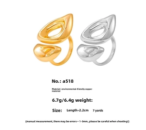 Detail of geometric hollow rings in gold and silver finish with precise size measurements