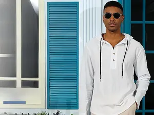 Detail of white linen hoodie with three-button neckline and contrasting black drawstrings