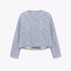 Short blue and white tweed jacket for women featuring a minimalist back view design