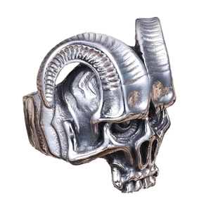Polished stainless steel ram horn skull ring with a vintage punk aesthetic finish