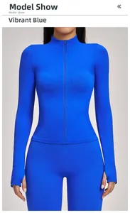 Detailed view of dazzling blue slim fit yoga jacket with stand collar and thumb holes
