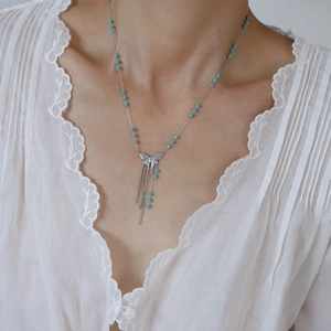 Silver stainless steel butterfly necklace with blue beads and elegant long tassels