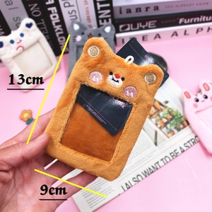Detail of plush cartoon bear card holder with 13x9cm dimensions and transparent PVC slot