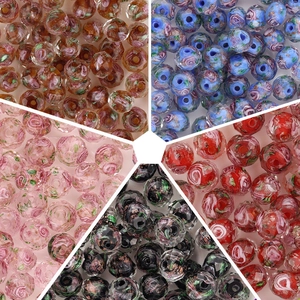 Macro view of multi-colored faceted crystal glass beads with floral patterns for DIY jewelry