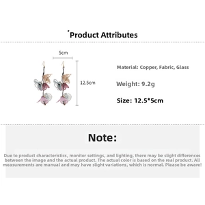 Detail showing fabric flower tassel earrings with material specs, 12.5x5cm size and 9.2g weight